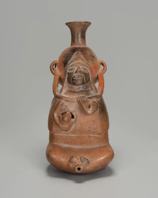 Paccha Representing a Woman Carrying a Vessel and Nursing a Child