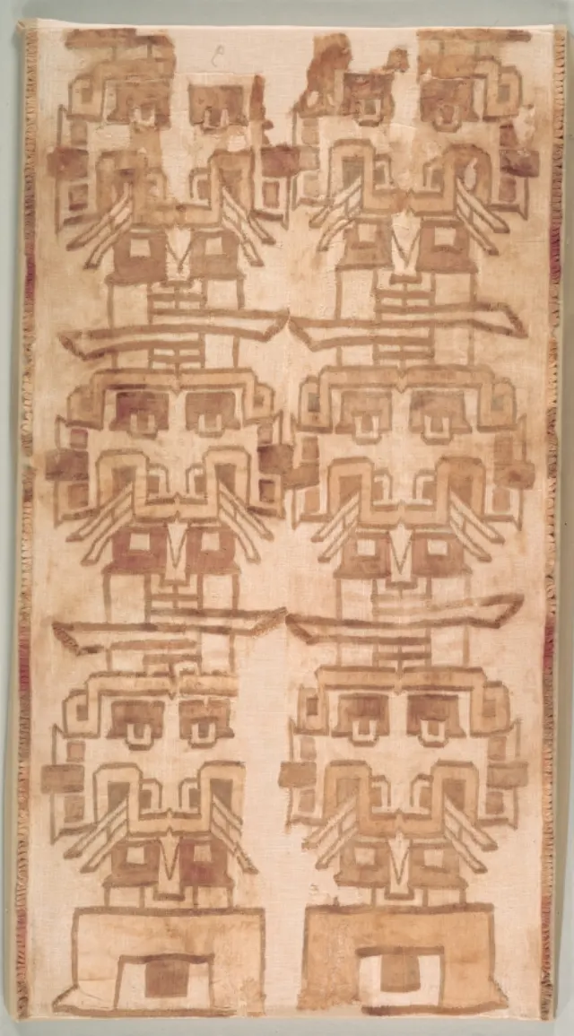 Two Textile Fragment with Fanged Heads
