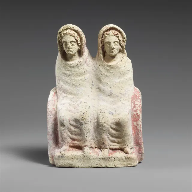 Terracotta votive statuette of two draped females