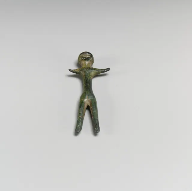 Bronze votive statuette of a standing human