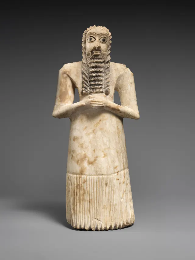 Standing male worshiper
